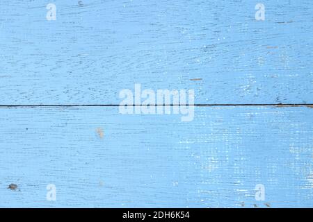 Verwitterter alter Holzhintergrund mit hellhimmelblauer Farbe. Holzstruktur Muster. Stockfoto