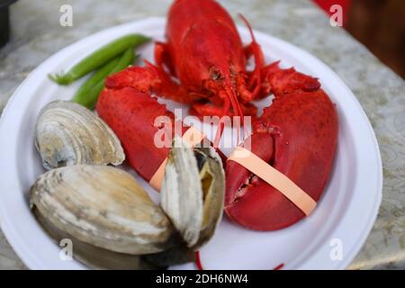 Hummer, Clam Bake Mahlzeit in Maine Stockfoto