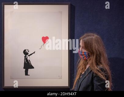 Bonhams, London, Großbritannien. 10 Dezember 2020. Bonhams Drucke und Kombiwetten Verkaufsvorschau. Bild: Banksy (geb. 1975), Mädchen mit Ballon, Siebdruck, 2006, Schätzung: £120,000-180,000. Der Verkauf findet am 15. Dezember 2020 statt. Quelle: Malcolm Park/Alamy Live News Stockfoto