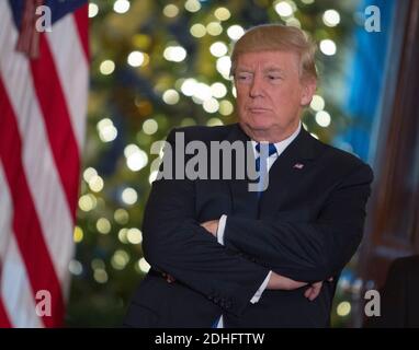 13. Dezember 2017- Washington DC- US-Präsident Donald J. Trump hört einer Gruppe von Familien, jungen Republikanern und College-Republikanern im Weißen Haus zu, während er darüber spricht, wie geplante Steuerreformen den Familien der Mittelschicht zugute kommen würden. Foto: Chris Kleponis/Sipa USA Stockfoto