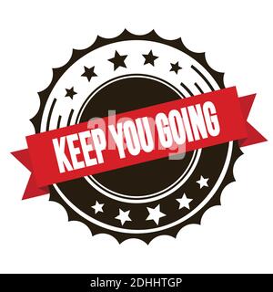 KEEP YOU GOING Text auf rot braunen Band Abzeichen Stempel. Stockfoto