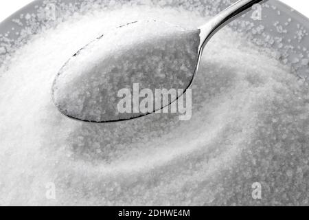 Feiner Kristall Zucker auf einem Loeffel Stockfoto