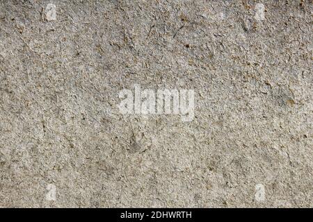 Holzstaub und Kork Textur mit verschiedenen Farben und organischen Fasern. Die Oberfläche wird durch trockene Feuchtigkeit entsorgt und ist voller Kratzer und Risse. Stockfoto