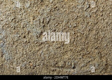 Eine schmutzige und alte Spanplatten-Textur als Hintergrund. Faules Holz. Stockfoto