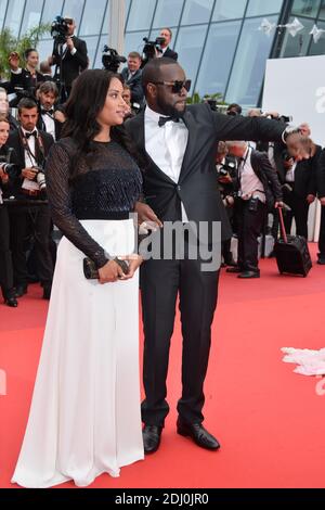 Maitre Gims und seine Freundin waren am 14. Mai 2016 im Palais des Festivals in Cannes, Frankreich, bei der Vorführung der BFG im Rahmen der 69. Filmfestspiele von Cannes. Foto von Lionel Hahn/ABACAPRESS.COM Stockfoto