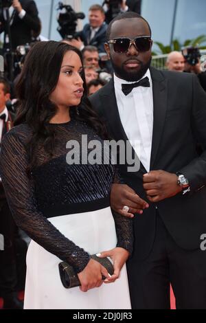 Maitre Gims und seine Freundin waren am 14. Mai 2016 im Palais des Festivals in Cannes, Frankreich, bei der Vorführung der BFG im Rahmen der 69. Filmfestspiele von Cannes. Foto von Lionel Hahn/ABACAPRESS.COM Stockfoto