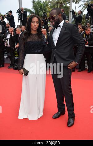 Maitre Gims und seine Freundin waren am 14. Mai 2016 im Palais des Festivals in Cannes, Frankreich, bei der Vorführung der BFG im Rahmen der 69. Filmfestspiele von Cannes. Foto von Lionel Hahn/ABACAPRESS.COM Stockfoto