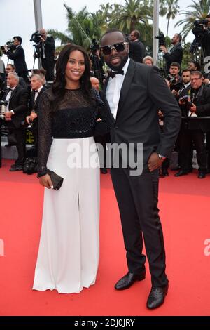 Maitre Gims und seine Freundin waren am 14. Mai 2016 im Palais des Festivals in Cannes, Frankreich, bei der Vorführung der BFG im Rahmen der 69. Filmfestspiele von Cannes. Foto von Lionel Hahn/ABACAPRESS.COM Stockfoto