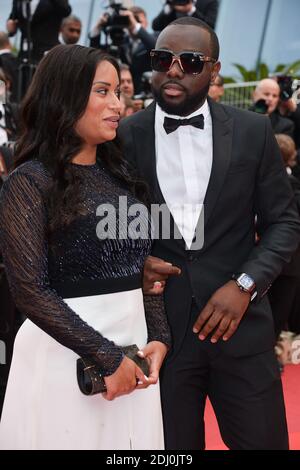 Maitre Gims und seine Freundin waren am 14. Mai 2016 im Palais des Festivals in Cannes, Frankreich, bei der Vorführung der BFG im Rahmen der 69. Filmfestspiele von Cannes. Foto von Lionel Hahn/ABACAPRESS.COM Stockfoto