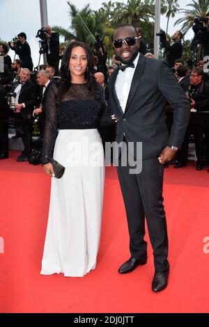 Maitre Gims und seine Freundin waren am 14. Mai 2016 im Palais des Festivals in Cannes, Frankreich, bei der Vorführung der BFG im Rahmen der 69. Filmfestspiele von Cannes. Foto von Lionel Hahn/ABACAPRESS.COM Stockfoto