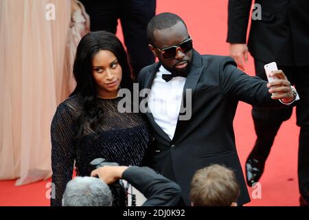 Maitre Gims und seine Freundin waren am 14. Mai 2016 im Rahmen der 69. Filmfestspiele von Cannes bei der "BFG"-Vorführung im Palais des Festivals in Cannes, Frankreich, dabei. Foto von Aurore Marechal/ABACAPRESS.COM Stockfoto