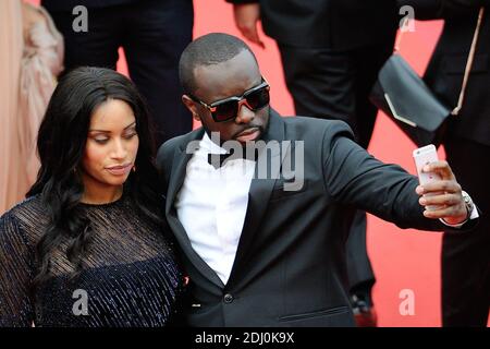 Maitre Gims und seine Freundin waren am 14. Mai 2016 im Rahmen der 69. Filmfestspiele von Cannes bei der "BFG"-Vorführung im Palais des Festivals in Cannes, Frankreich, dabei. Foto von Aurore Marechal/ABACAPRESS.COM Stockfoto