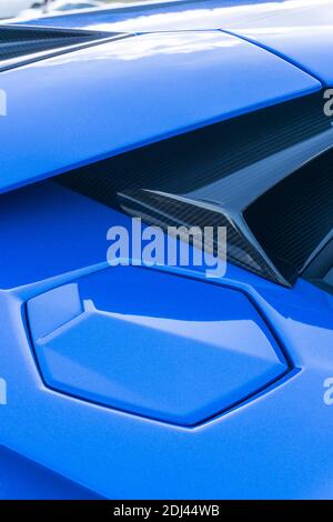 Close up detail of the fuel filler cap and body panels on a blu le mans Lamborghini Aventador S LP740-4 Stock Photo