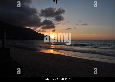 Sunset on the beach of beau vallon.Mahé is the largest island in the Seychelles archipelago, in the Indian Ocean off East Africa. Truly heaven on earth Stock Photo