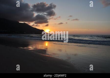 Sunset on the beach of beau vallon.Mahé is the largest island in the Seychelles archipelago, in the Indian Ocean off East Africa. Truly heaven on earth Stock Photo