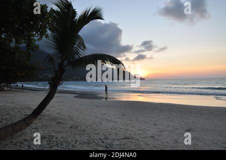 Sunset on the beach of beau vallon.Mahé is the largest island in the Seychelles archipelago, in the Indian Ocean off East Africa. Truly heaven on earth Stock Photo