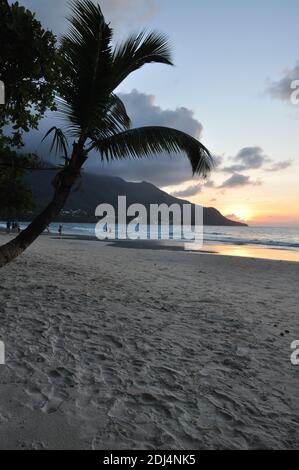 Sunset on the beach of beau vallon.Mahé is the largest island in the Seychelles archipelago, in the Indian Ocean off East Africa. Truly heaven on earth Stock Photo