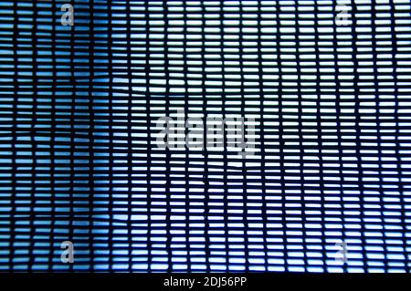 Netzstruktur. Netz im Fenster. Raster für den Hintergrund. Stockfoto