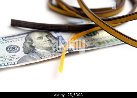 Klebedichtung für Wärmeeinsparungen und 100 US-Dollar, Nahaufnahme, Wärmeeinsparung, Stockfoto