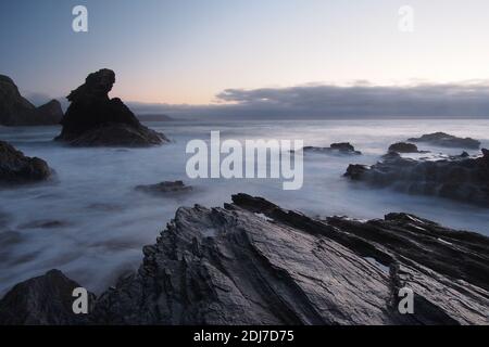 Ciborth und Carreg Bica von Felsen bei Sonnenuntergang Stockfoto