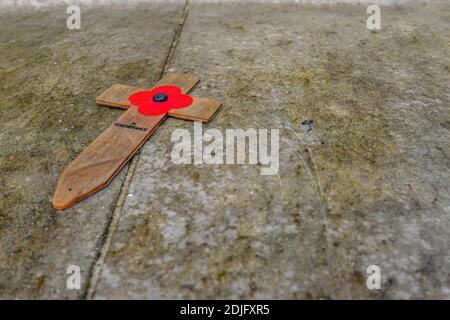 London/UK. 12.2.20. Remembrance day poppies left next to the war memorial in the atmospheric western part of Highgate Cemetery in north London Stock Photo