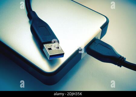 Festplatte auf einem grauen Hintergrund closeup Stockfoto