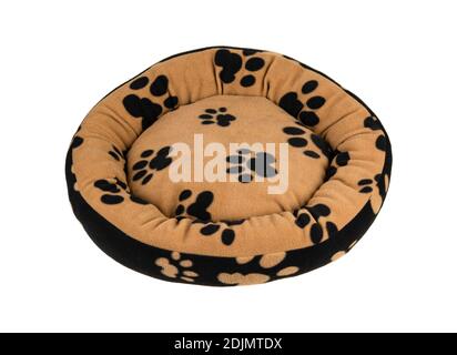 Pet's Paw Print auf einem weichen und flauschigen Hundebett isoliert auf weißem Hintergrund. Stockfoto
