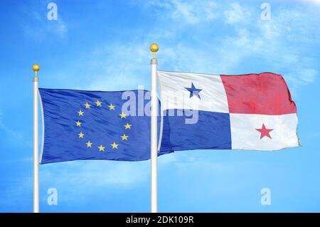 Europäische Union und Panama zwei Flaggen auf Fahnenmasten und blau wolkiger Himmel Stockfoto