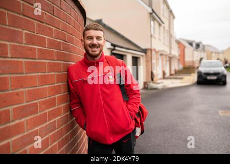 REDAKTIONELLE VERWENDUNG NUR Adam Prowse wurde in der Shortlist als einer der beliebtesten Postarbeiter Großbritanniens über die Kampagne "Thank you postie" der Highstreet, Cranbrook, Devon, aufgeführt. Stockfoto