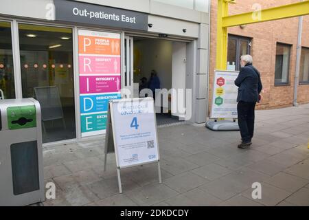 Outpatients entrance, Norfolk & Norwich Universities Hospital NHS Trust with Covid-19 warning signs, Norwich UK December 2020 Stock Photo