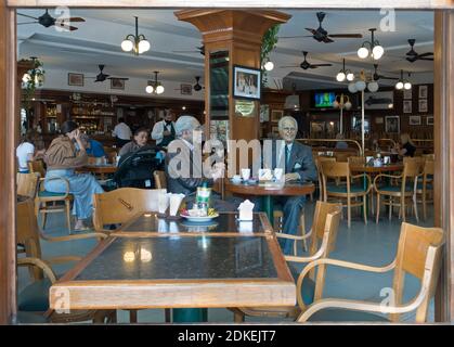 Statues of Argentine writers Jorge Luis Borges and Adolfo Bioy Casares in La Biela cafeteria, Recoleta, Buenos Aires, Argentina Stock Photo