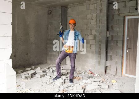 architecture and home renovation concept - foreman for renovation in the apartment Stock Photo