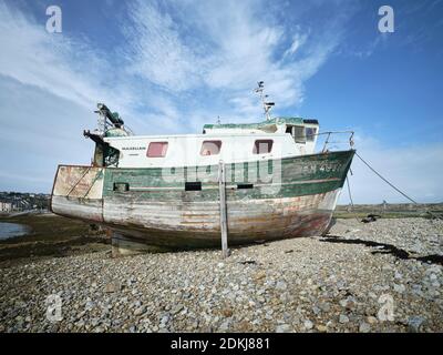 Decaying fishing trawler in the ship cemetery of Camaret-sur-Mer in Brittany. Stock Photo