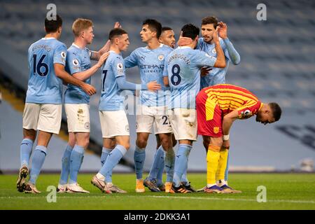 Manchester, Großbritannien. Dezember 2020. Ilkay Gundogan (3. R) von Manchester City feiert mit seinen Teamkollegen nach dem Tor beim Premier League Fußballspiel zwischen Manchester City und West Bromwich Albion am 15. Dezember 2020 im Etihad Stadium in Manchester, Großbritannien. Quelle: Xinhua/Alamy Live News Stockfoto