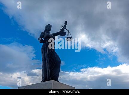 Statue of Justice The combination of Justitia, the Roman goddess of justice, and Themis, the goddess of divine order, law and traditions in Greek myth Stock Photo