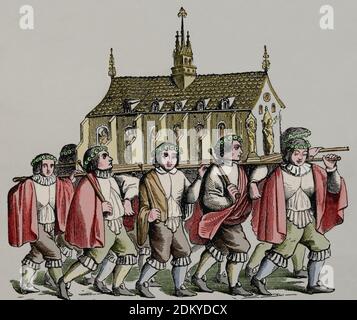 The corporation of the godsmiths of city of Paris, carrying the coffin of Saint Genevieve. France. 17th century. Engraving. Later colouration. Stock Photo