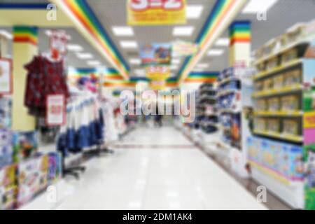 Abstraktes unscharfes und unscharf verwischtes Bild von Supermarkt oder Einkaufszentrum für Hintergrund, Hintergrund oder Stoff. Stockfoto