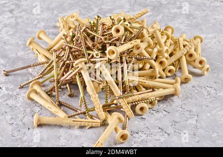 dowel screws on a concrete surface Stockfoto