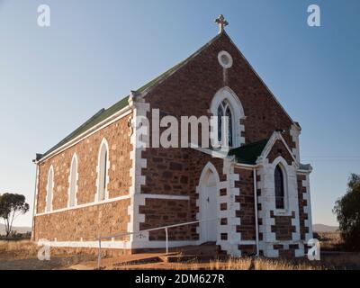 Kolonialzeit bluestone katholische Kirche in der Nähe der Flinders Ranges, South Australia. Stockfoto