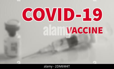 COVID-19 Impfstoffbeschriftung auf schwarzem und weißem Hintergrund. Stockfoto