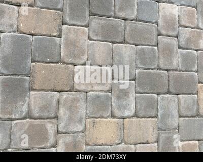 Backstein Fertiger Hintergrund in einem zufälligen Muster mit braunen, grauen und tan Farbtöne. Stockfoto