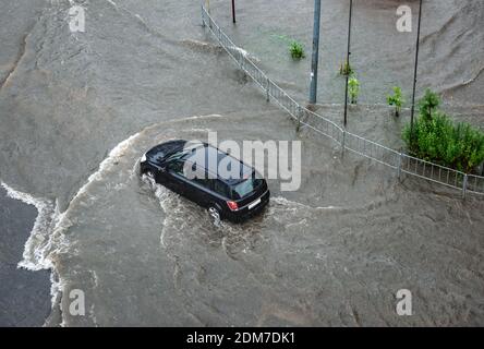 Heavy rains caused flooding on the city's roads. Stockfoto