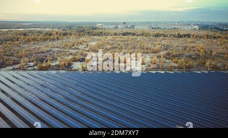 Solar panels far from the city. aerial view on solar panels. ECO city concept Stockfoto