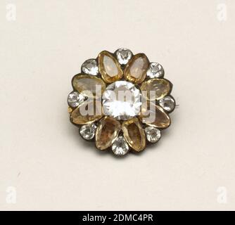 Brooch, Glass brilliants in silver, Brooch in the form of a flower with a white center, eight yellow petals and a small white stone set between each two petals. Pin is a replacement., France, 19th century, jewelry, Decorative Arts, Brooch Stock Photo