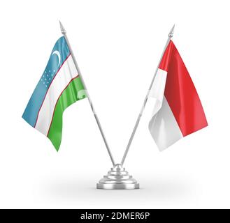 Indonesien und Usbekistan Tischflags isoliert auf weißem 3D-Rendering Stockfoto