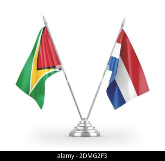 Netherlands and Guyana table flags isolated on white 3D rendering Stock Photo