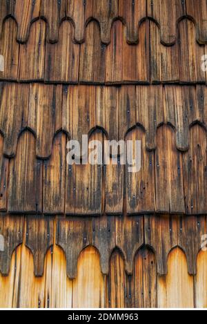 full frame closeup shot showing a weathered wooden shingles background Stock Photo