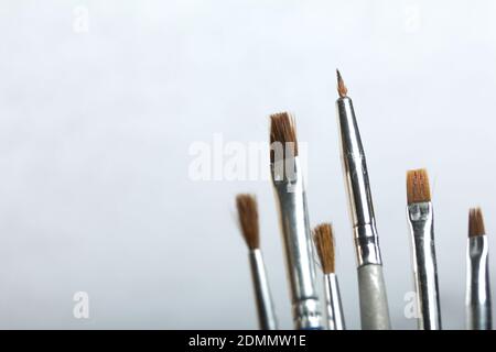 Pinsel malen. Auf einem hellen Hintergrund. Stockfoto