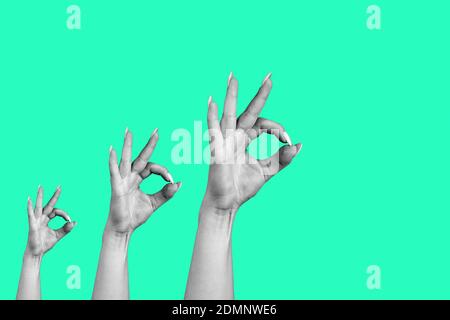 Kunstcollage der weiblichen Hände gestikulierend des okay Zeichens isoliert auf grünem Hintergrund. Stockfoto