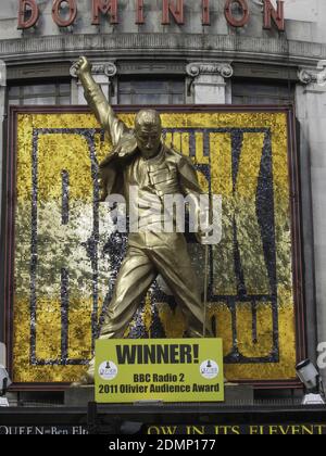 LONDON, UNITED KINGDOM - Jun 08, 2012: The iconic statue outside the Dominion Theatre for the show We Will Rock You. Stock Photo